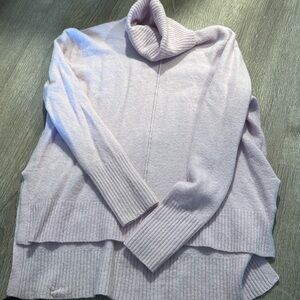 Light purple light weight turtle neck sweater.